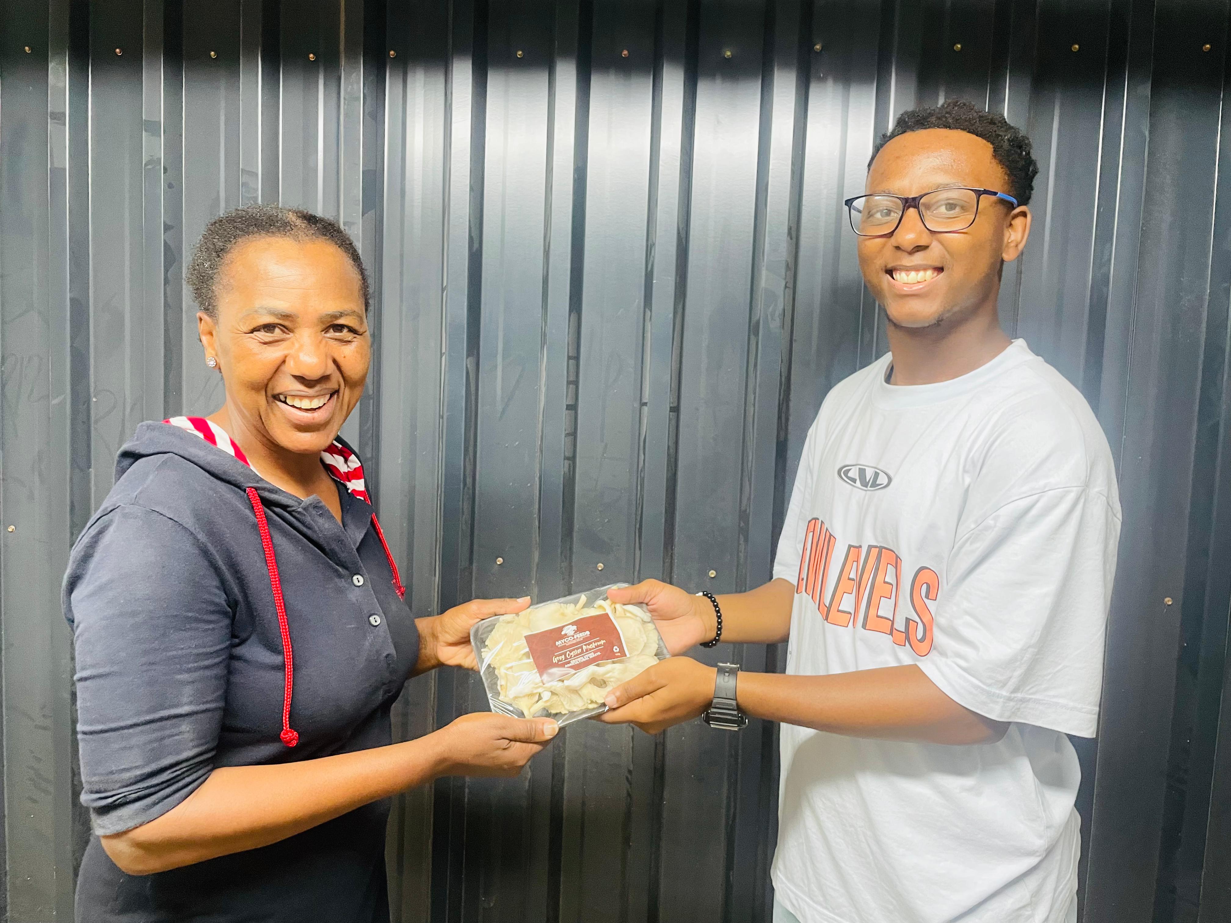 Customer receiving fresh mushroom products
